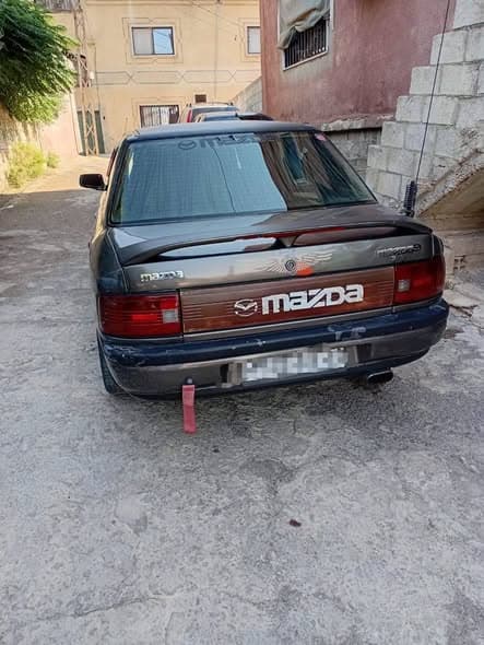 مازدا 323 1993 - صورة 2