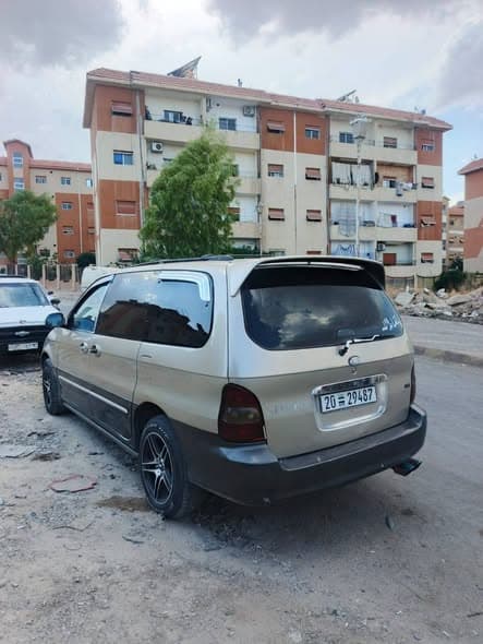 كيا كرنفال 2002 - صورة 3