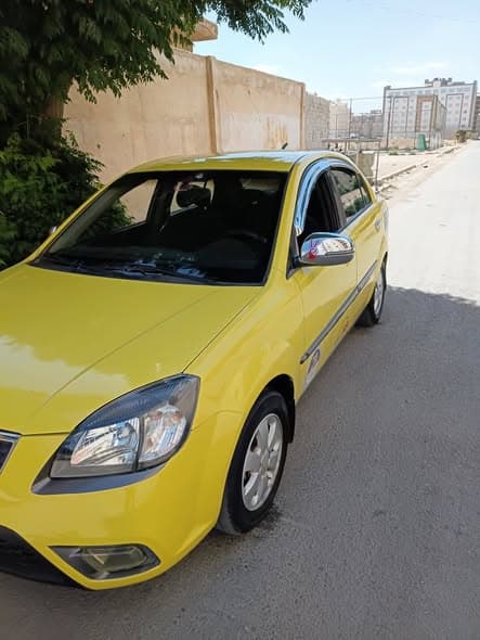 كيا ريو 2011 - صورة 5