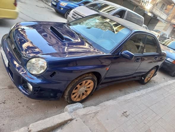 سوبارو امبريزا 2002