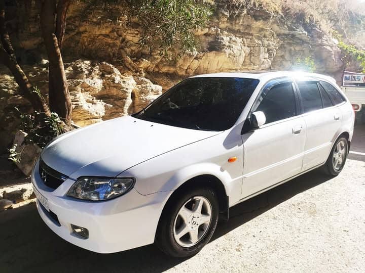 مازدا 323 2004