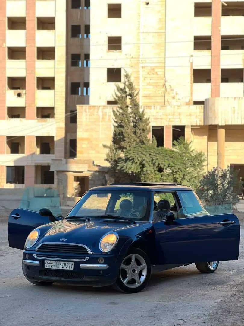ميني كوبر 2003 بحالة ممتازة تقبل داكيشة