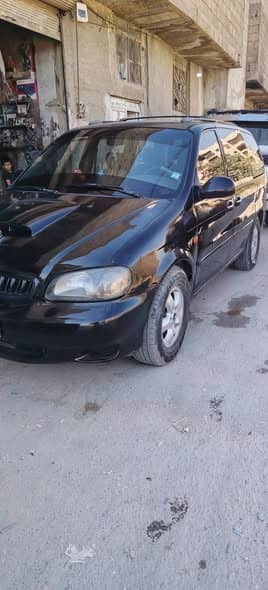كيا كرنفال 2001