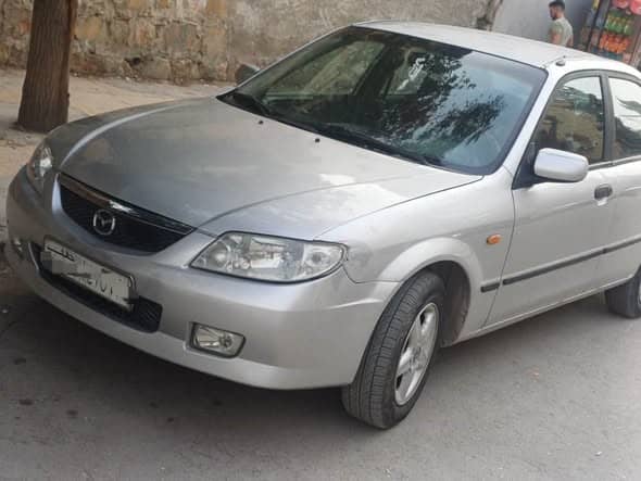 مازدا 323 2002