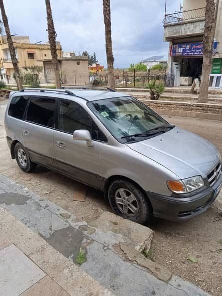 هيونداي تراجيت 2002
