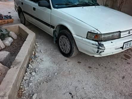 مازدا كابيلا 1998