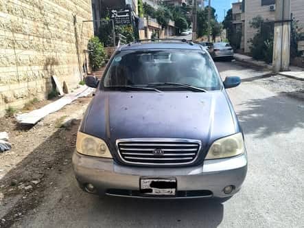 كيا كرنفال 2002