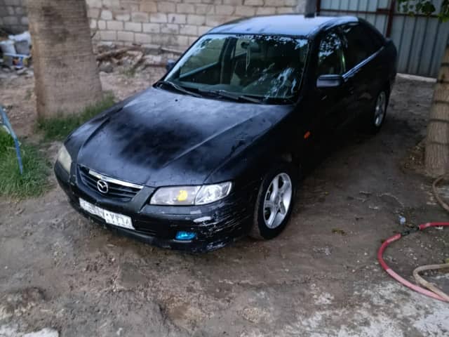 مازدا 323 موديل 2007 بحالة جيدة