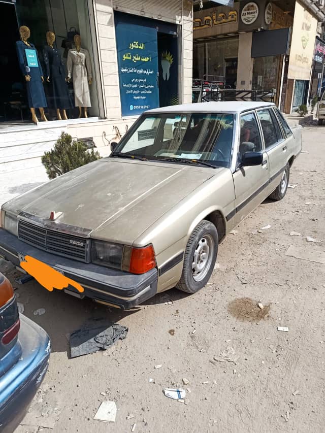مازدا 929 بحالة جيدة خالية من الداخل وخالية من الحوادث بخ كامل من برا السيارة جاهزة ع الركب